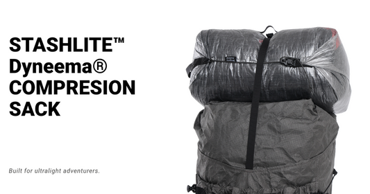 HODRGEAR's gray Dyneema compression sack attached to backpack, ultralight design