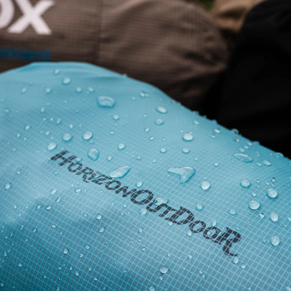 Blue Silnylon ultralight stuff sack with water droplets, water-resistant by HODRGEAR