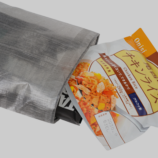 Gray ultralight Dyneema flat pouch holding trail food packages