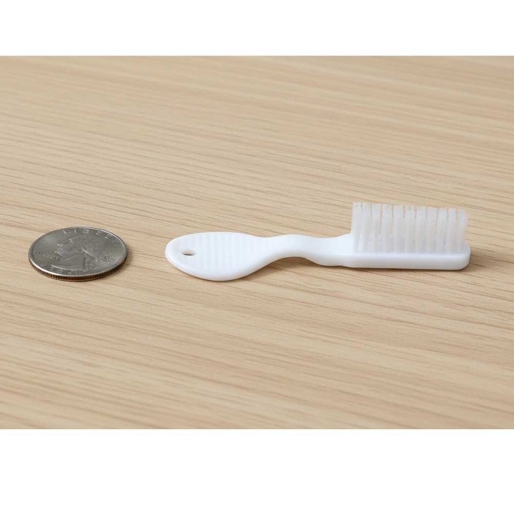 HODR white toothbrush for lightweight travel pouch