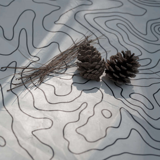 Tyvek vestibule mat with topographic pattern, pine cones & needles - HODRGEAR ultralight gear