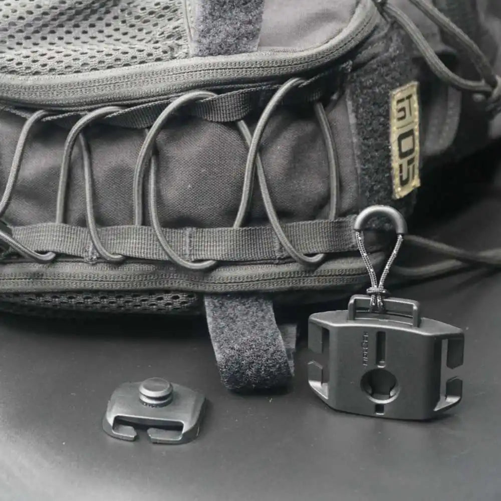 FIDLOCK Molle Clip close-up on MOLLE panel
