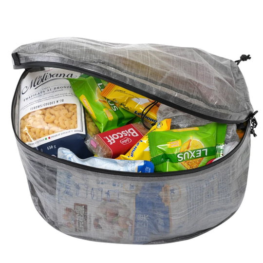 Gray dcf bag with snacks including Melians, Biscuit, and Lexus on a white background